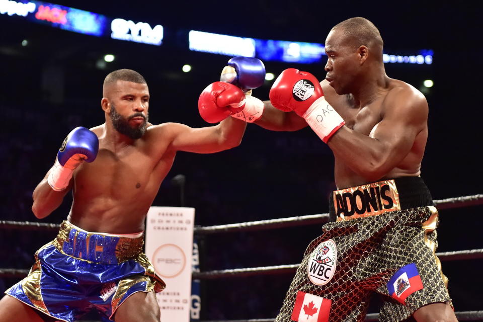 WBC light heavyweight champion Adonis Stevenson (R) and challenger Badou Jack maneuver for position during their majority draw Saturday at the Air Canada Centre in Toronto. (Canadian Press/Photostream)