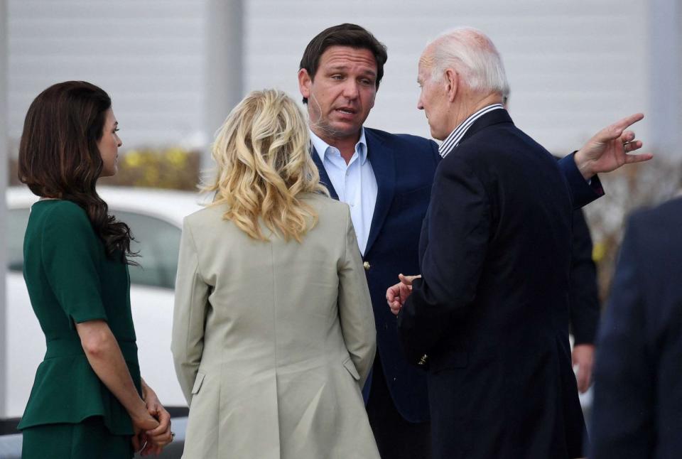 PHOTO: In this Oct. 5, 2022, file photo, Florida Governor Ron DeSantis, his wife Casey, President Joe Biden, and First Lady Jill Biden chat during a visit to impacted areas by Hurricane Ian at Fishermans Pass in Fort Myers, Fla. (Olivier Douliery/AFP via Getty Images, FILE)