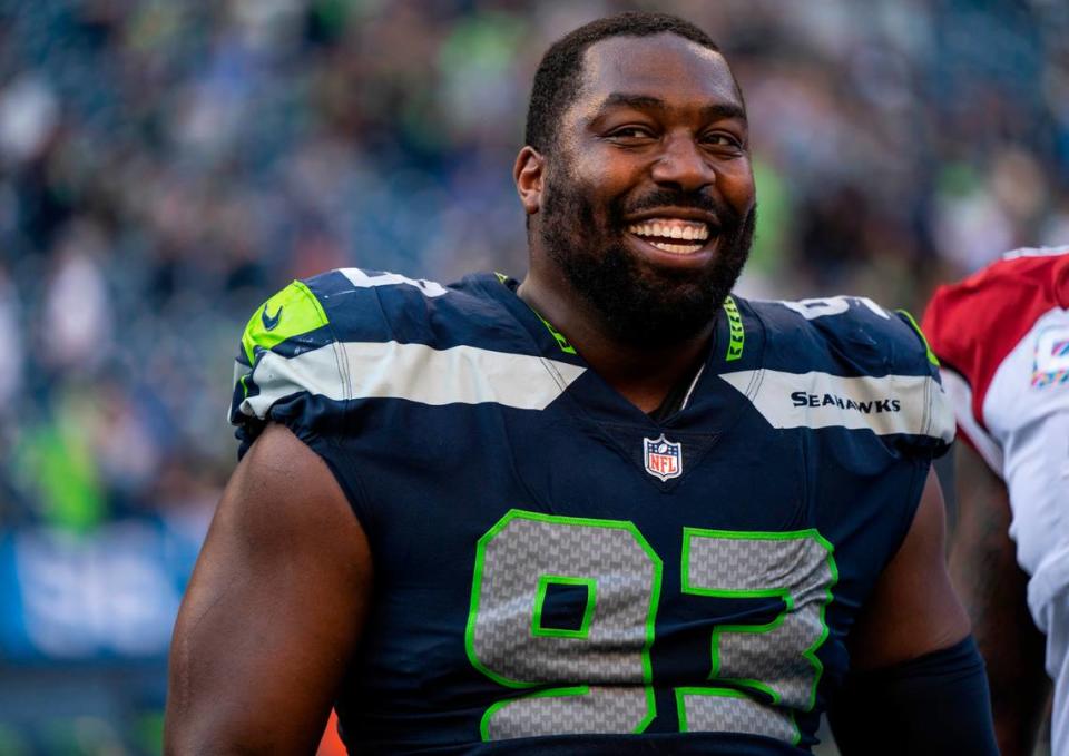Seattle Seahawks defensive end Shelby Harris (93) smiles after winning 19-9 against the Arizona Cardinals at an NFL game on Sunday, Oct. 16, 2022, at Lumen Field in Seattle.