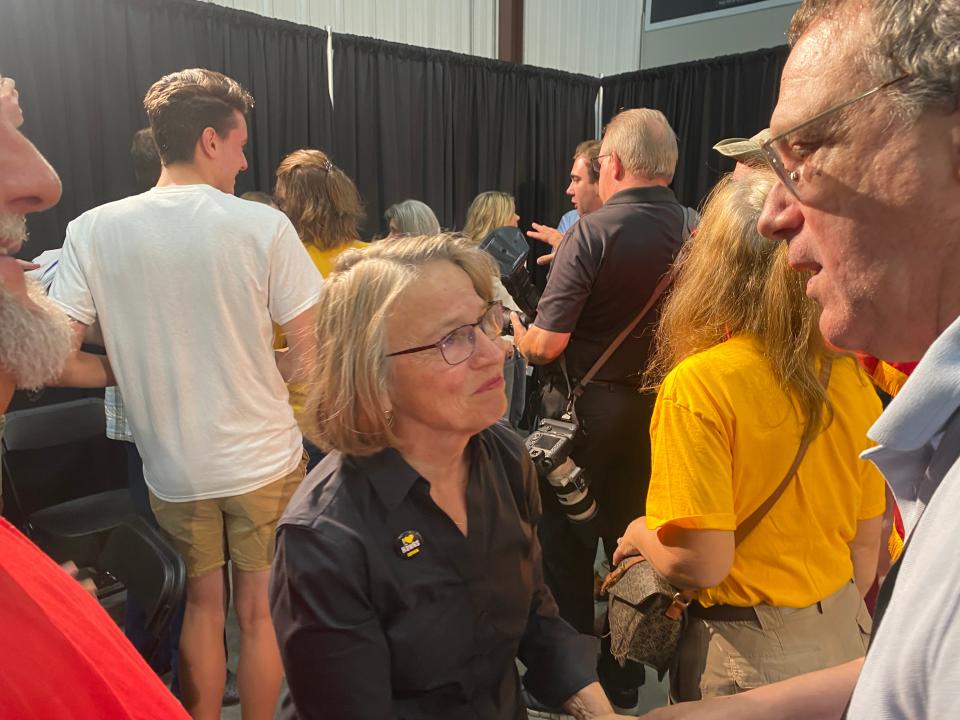 U.S. Rep. Mariannette Miller-Meeks mingles with supporters during her annual tailgate fundraiser in Johnson County on Saturday. Miller-Meeks had the help of prominent Republican politicians as she seeks to retain her seat against challenger Christina Bohannon.