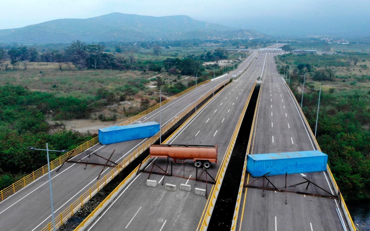 The Tienditas Bridge, on the border between Colombia Venezuela, after Venezuelan military forces blocked it with containers - AFP