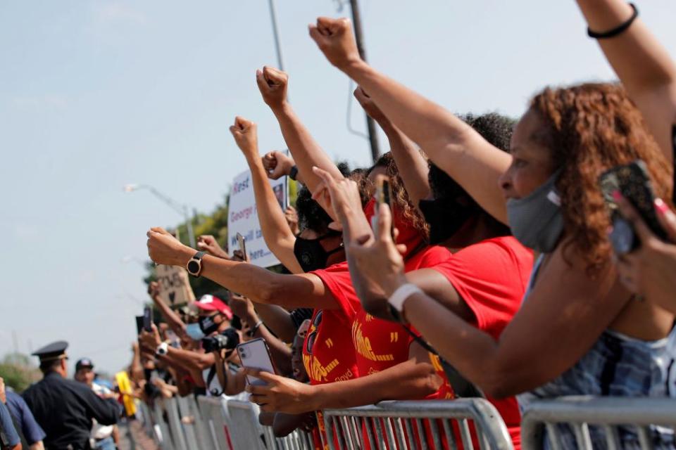 In Houston, people turned out to watch Floyd’s funeral procession go by.