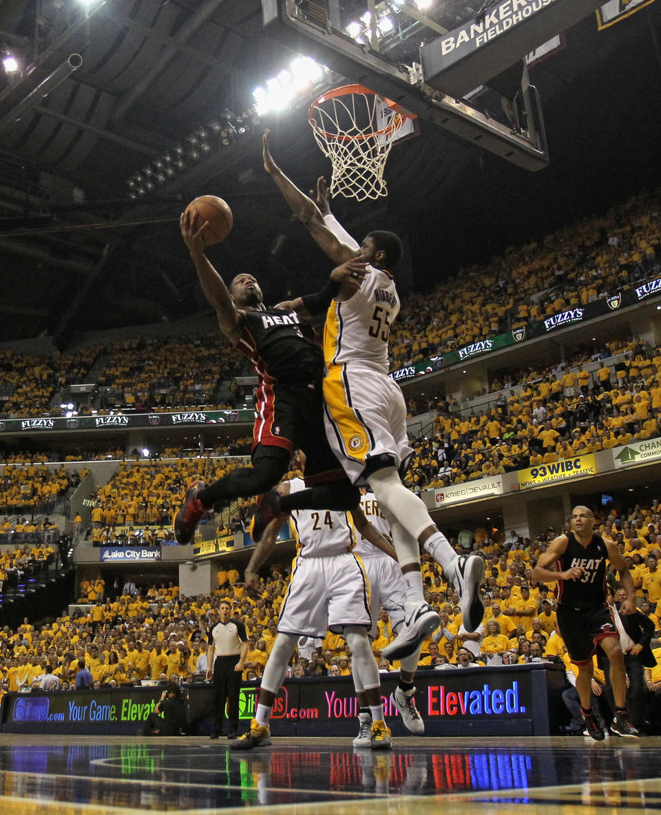 INDIANAPOLIS, IN - MAY 24: Dwyane Wade #3 of the Miami Heat goes up for a shot against Roy Hibbert #55 of the Indiana Pacers in Game Six of the Eastern Conference Semifinals in the 2012 NBA Playoffs at Bankers Life Fieldhouse on May 24, 2012 in Indianapolis, Indiana. NOTE TO USER: User expressly acknowledges and agrees that, by downloading and/or using this photograph, User is consenting to the terms and conditions of the Getty Images License Agreement. (Photo by Jonathan Daniel/Getty Images)