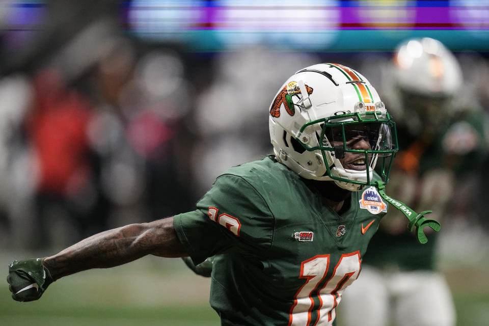 Florida A&M wide receiver Jah'Marae Sheread (10) celebrates his touchdown against Howard during the second half of an NCAA Celebration Bowl football game, Saturday, Dec. 16, 2023, in Atlanta. (AP Photo/Mike Stewart)