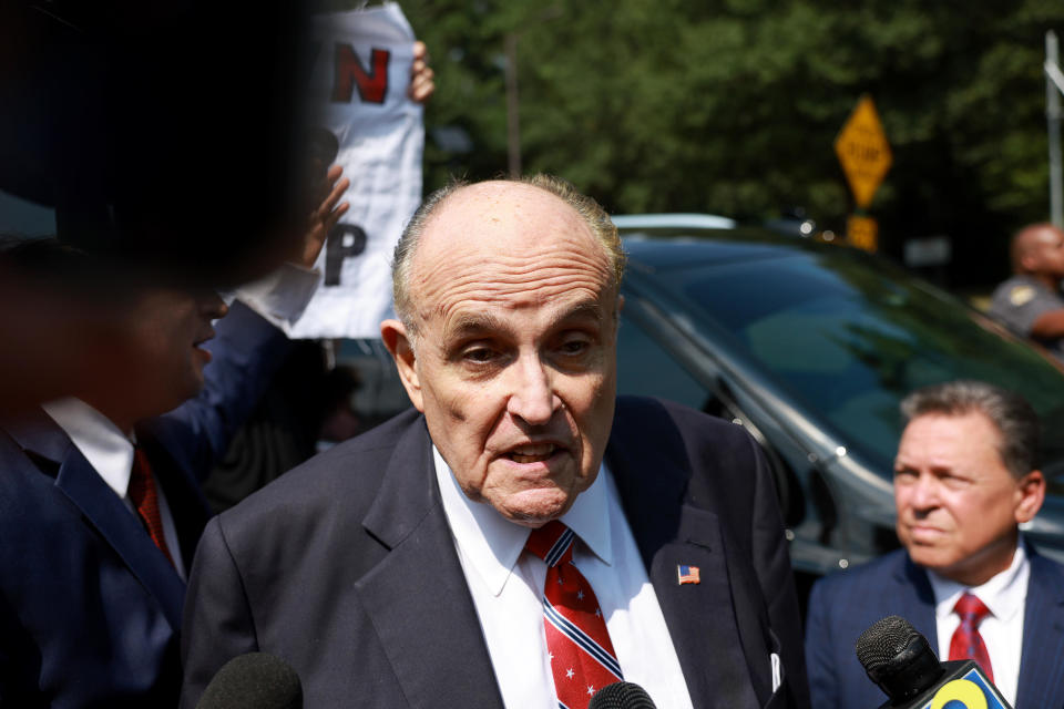 Rudy Giuliani speaks to the media after leaving the Fulton County jail on August 23, 2023 in Atlanta, Georgia.  / Credit: / Getty Images
