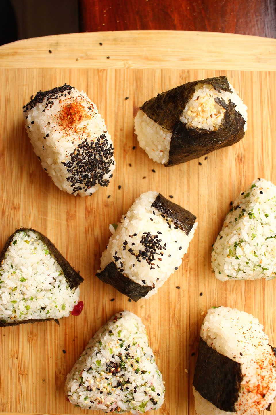 <p>If you're a <a href="https://www.delish.com/cooking/recipe-ideas/g40785924/sushi-recipes/" rel="nofollow noopener" target="_blank" data-ylk="slk:sushi" class="link ">sushi</a> fan, onigiri is a must-try: a humble rice ball accented by a variety of fillings, wrapped in roasted seaweed (nori), and perfect for snacking or a light meal. Onigiri is open to customization and experimentation too—try one of our filling options, or create your own.</p><p>Get the <strong><a href="https://www.delish.com/cooking/recipe-ideas/a34195640/onigiri-recipe/" rel="nofollow noopener" target="_blank" data-ylk="slk:Onigiri (Japanese Rice Balls) recipe" class="link ">Onigiri (Japanese Rice Balls) recipe</a></strong>.</p>