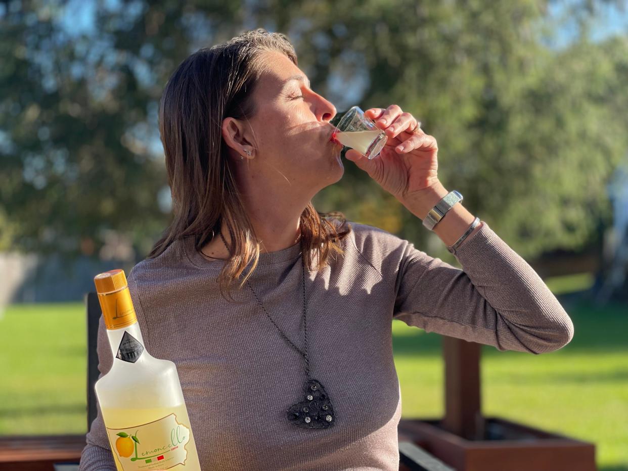 Company co-founder Sara Pistolesi sips a cold glass of Lemoncello 50010, which is made from her Italian family's recipe.