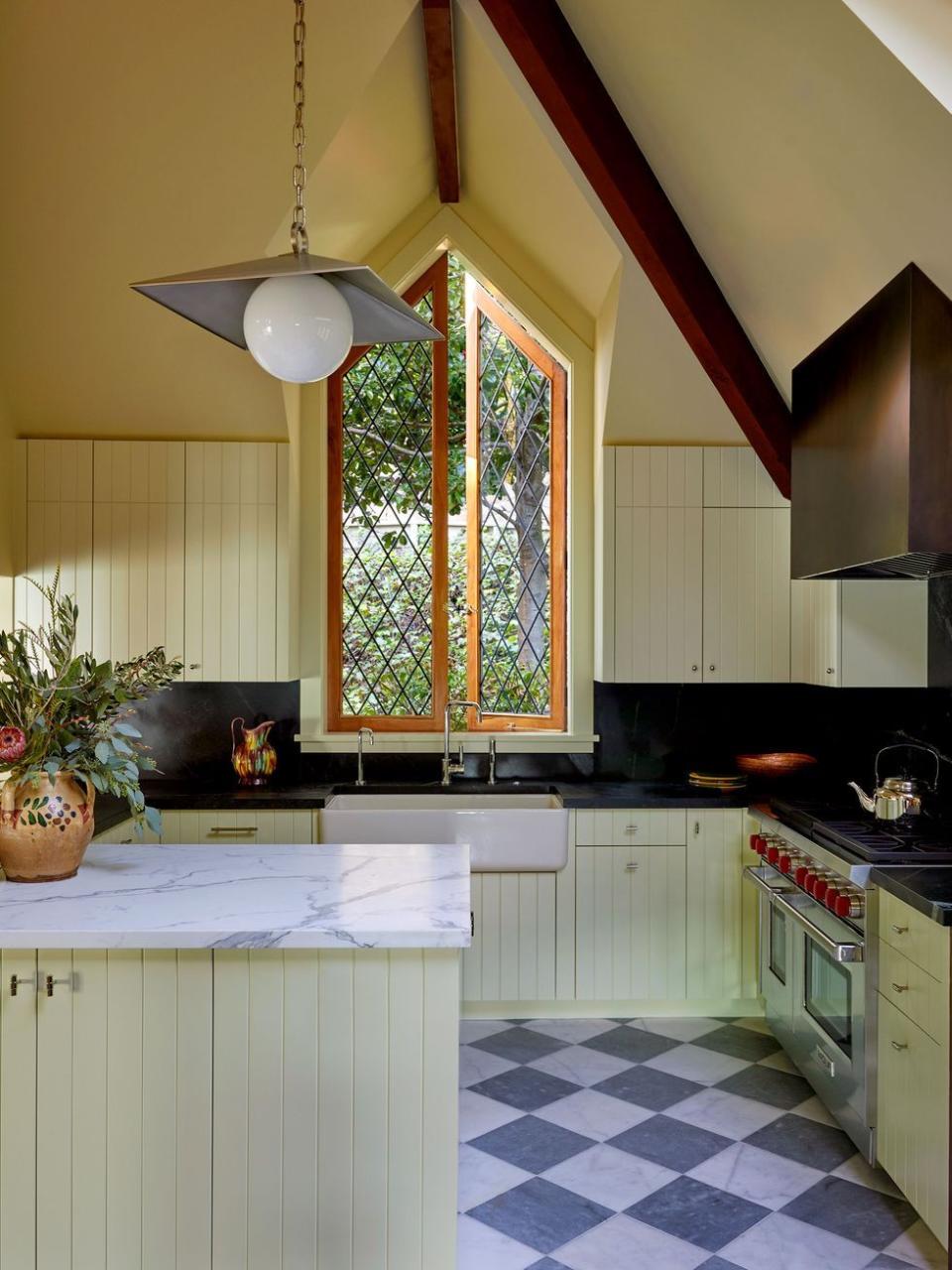 a kitchen with a chandelier