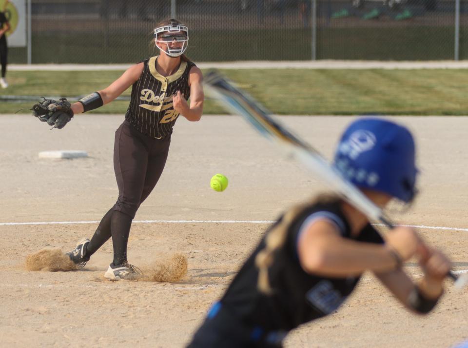 Lexi Miller pitches to a Carroll batter.