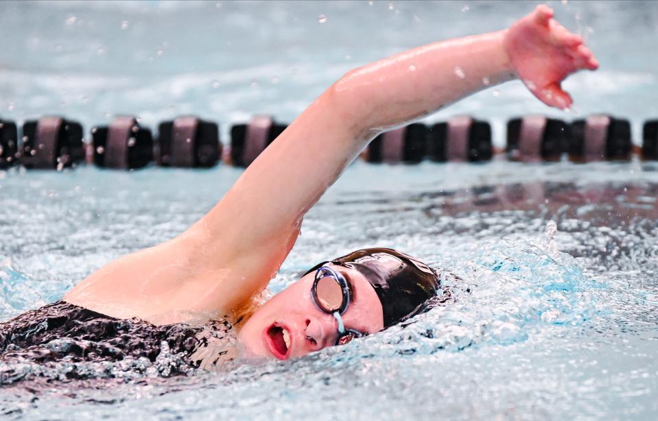 Edgewood’s Ellie Lewis competes in the 500 free during their dual meet against Bloomington North at North on Tuesday, Jan. 23, 2024.