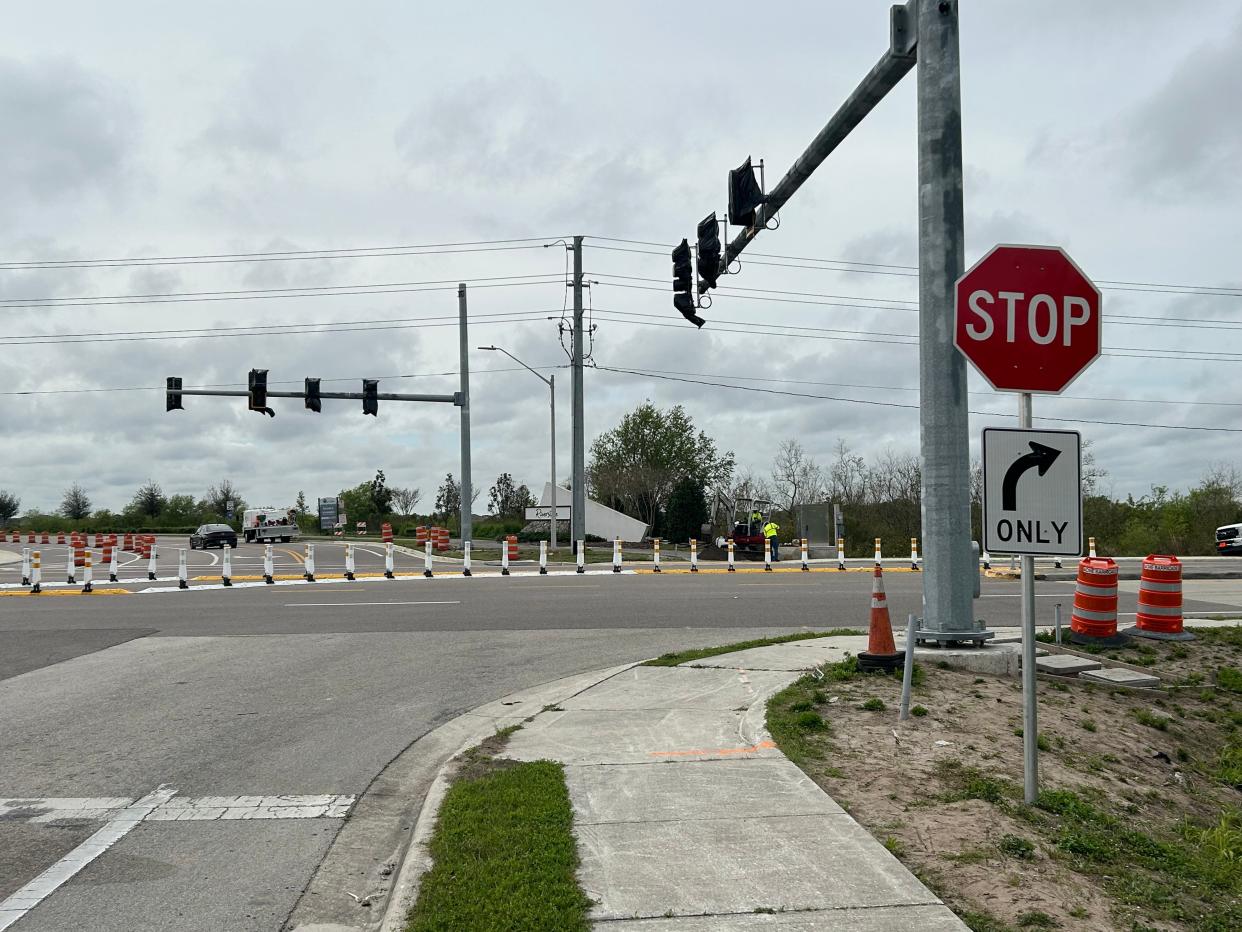 Three months after a student at Central Florida Aerospace Academy was killed on his way to school, new traffic signals are installed at West Pipkin and Medulla roads. The lights aren't turned on yet, and traffic cones still prevent cars from turning left onto Pipkin.