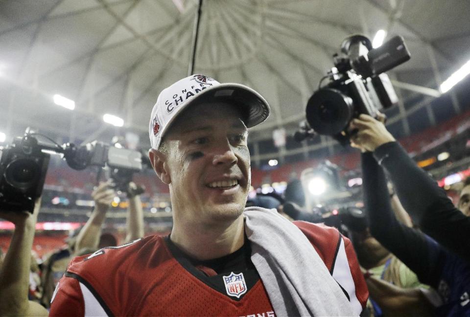 Atlanta Falcons' Matt Ryan walks off the field after the NFL football NFC championship game against the Green Bay Packers, Sunday, Jan. 22, 2017, in Atlanta. The Falcons won 44-21 to advance to Super Bowl LI. (AP Photo/David Goldman)