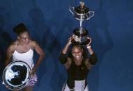 Tennis - Australian Open - Melbourne Park, Melbourne, Australia - 28/1/17 Serena Williams of the U.S. holds her trophy after winning her Women's singles final match against Venus Williams of the U.S. .REUTERS/Jason Reed