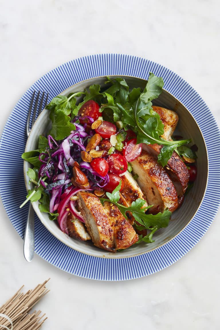 <p> Spice up your dinner routine with this tasty moroccan chicken bowl. Loaded with a tangy slaw and tomato salad, you definitely won't be missing out on any flavor.</p><p><em><a href="https://www.womansday.com/food-recipes/food-drinks/recipes/a61042/moroccan-chicken-bowl-recipe/" rel="nofollow noopener" target="_blank" data-ylk="slk:Get the Moroccan Chicken Bowl recipe;elm:context_link;itc:0;sec:content-canvas" class="link ">Get the Moroccan Chicken Bowl recipe</a>.</em></p>