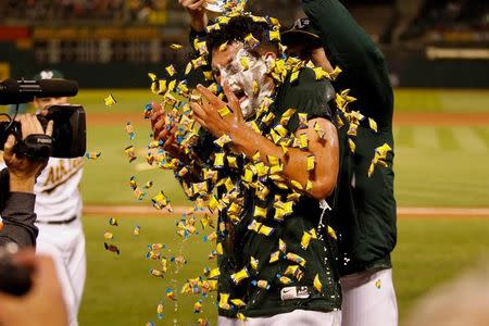 Apr 21, 2018; Oakland, CA, USA; Oakland Athletics pitcher Sean Manaea (55) celebrates with teammates after throwing a no hitter against the Boston Red Sox at Oakland Coliseum. Mandatory Credit: Kiel Maddox-USA TODAY Sports