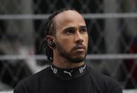 Mercedes driver Lewis Hamilton of Britain looks on before the Russian Formula One Grand Prix at the Sochi Autodrom circuit, in Sochi, Russia, Sunday, Sept. 26, 2021. (AP Photo/Sergei Grits)