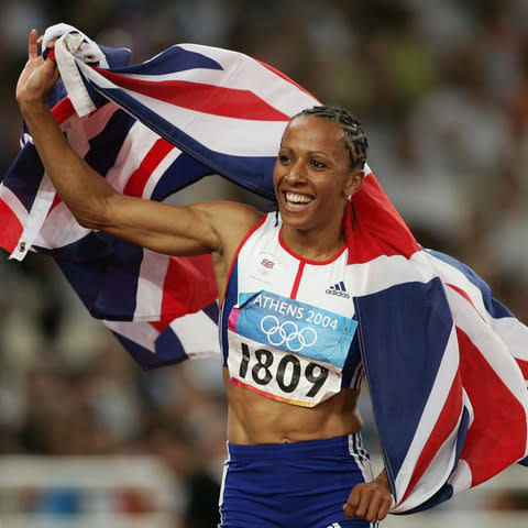 elly Holmes of Great Britain celebrates after she won gold in the women's 1,500 metre final on August 28, 2004 during the Athens 2004 Summer Olympic Games - Credit: Ian Waldie/Getty