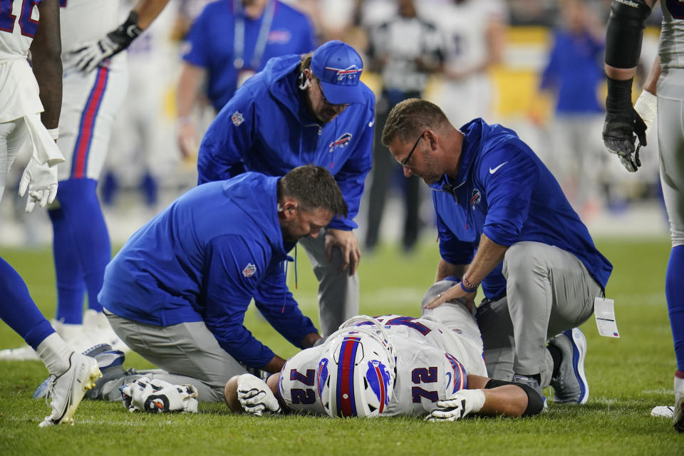 Buffalo Bills offensive tackle Tommy Doyle (72) lays on the field after an injury in the second half of an NFL preseason football game against the Pittsburgh Steelers, in Pittsburgh, Saturday, Aug. 19, 2023. (AP Photo/Gene Puskar)