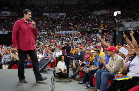 Venezuela's President Nicolas Maduro (L) speaks during a gathering in support of him and his proposal for the National Constituent Assembly in Caracas, Venezuela June 27, 2017. Miraflores Palace/Handout via REUTERS