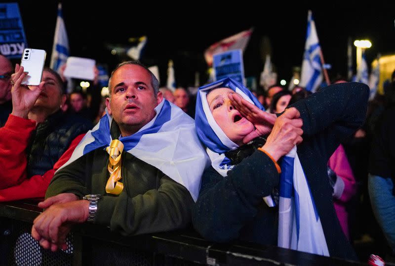 People protest against Israeli Prime Minister Benjamin Netanyahu's government in Tel Aviv