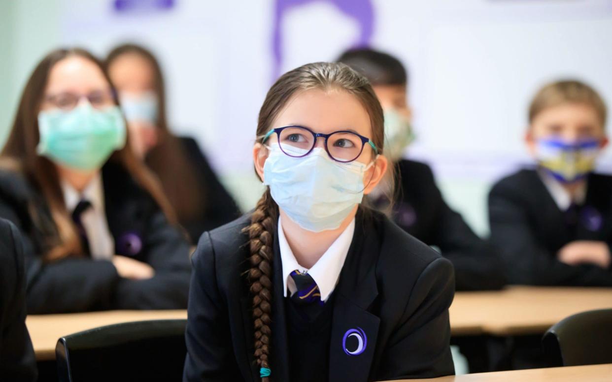 Children wearing facemasks during a lesson at Outwood Academy in Woodlands, Doncaster in Yorkshire - Danny Lawson/PA