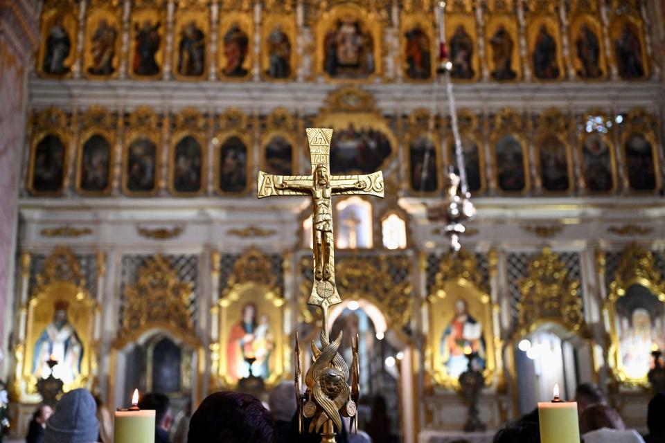 At a church in Uzhhorod, Ukraine, believers pray for their relatives and victims of the war against Russia on Jan. 28, 2024. In February, the International Religious Freedom or Belief Alliance said Russia has killed 30 Ukrainian religious leaders and held 26 captive in the past two years.