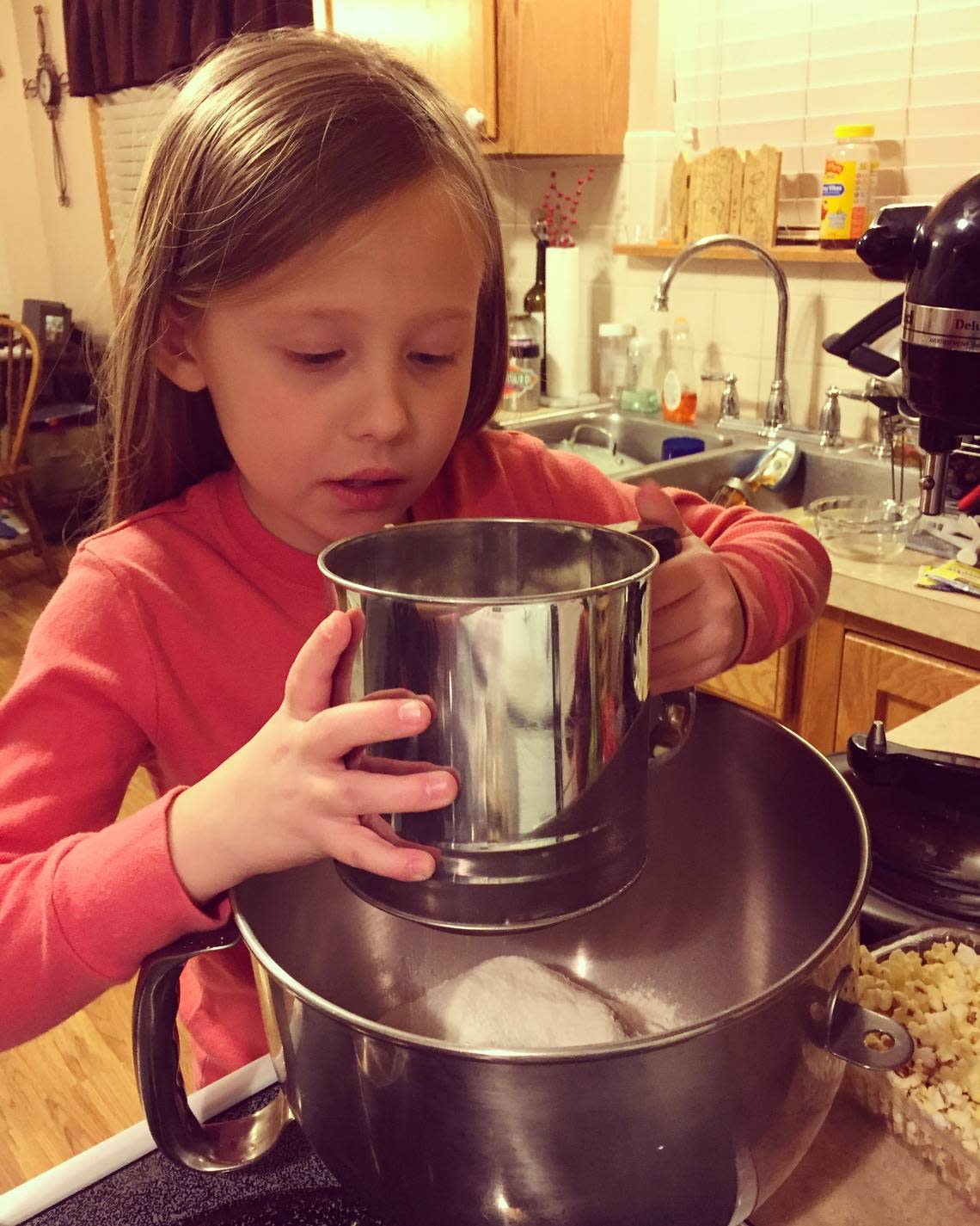Lillian Grover is now 13 and less interested in povitica making. But when she was little, she loved to help her mom, Katie, with the annual bake. Katie Grover/Courtesy