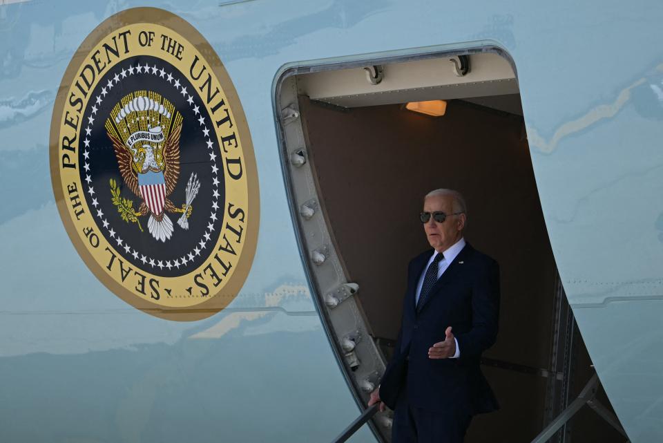 President Joe Biden steps off Air Force One in Romulus, Mich., on May 19, 2024.