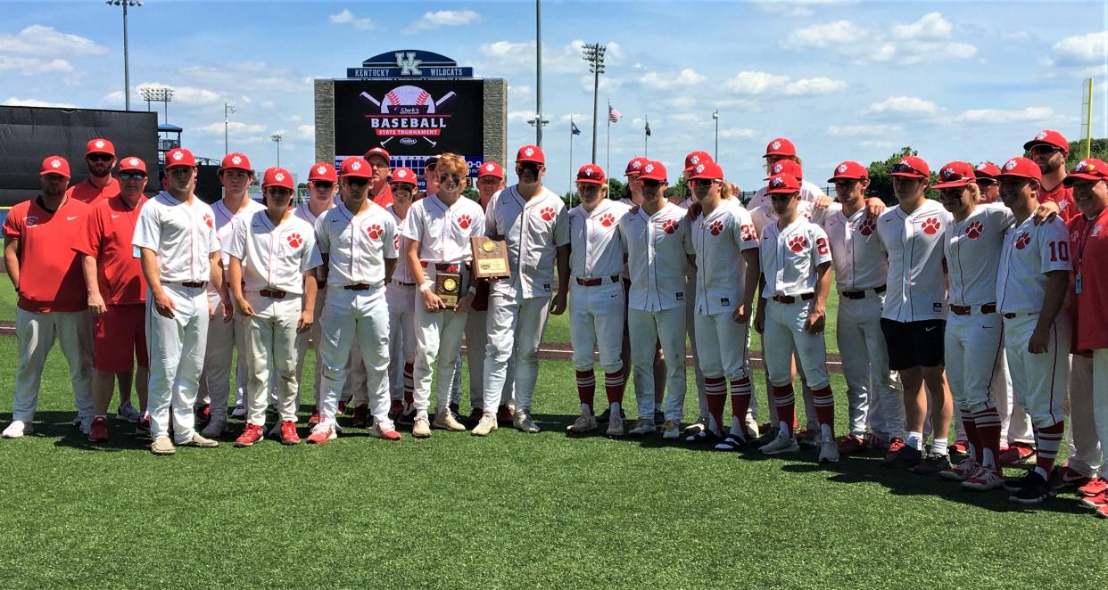 Beechwood baseball with its state quarterfinal trophy, June 4, 2022, after its season-ending loss to Russell County.