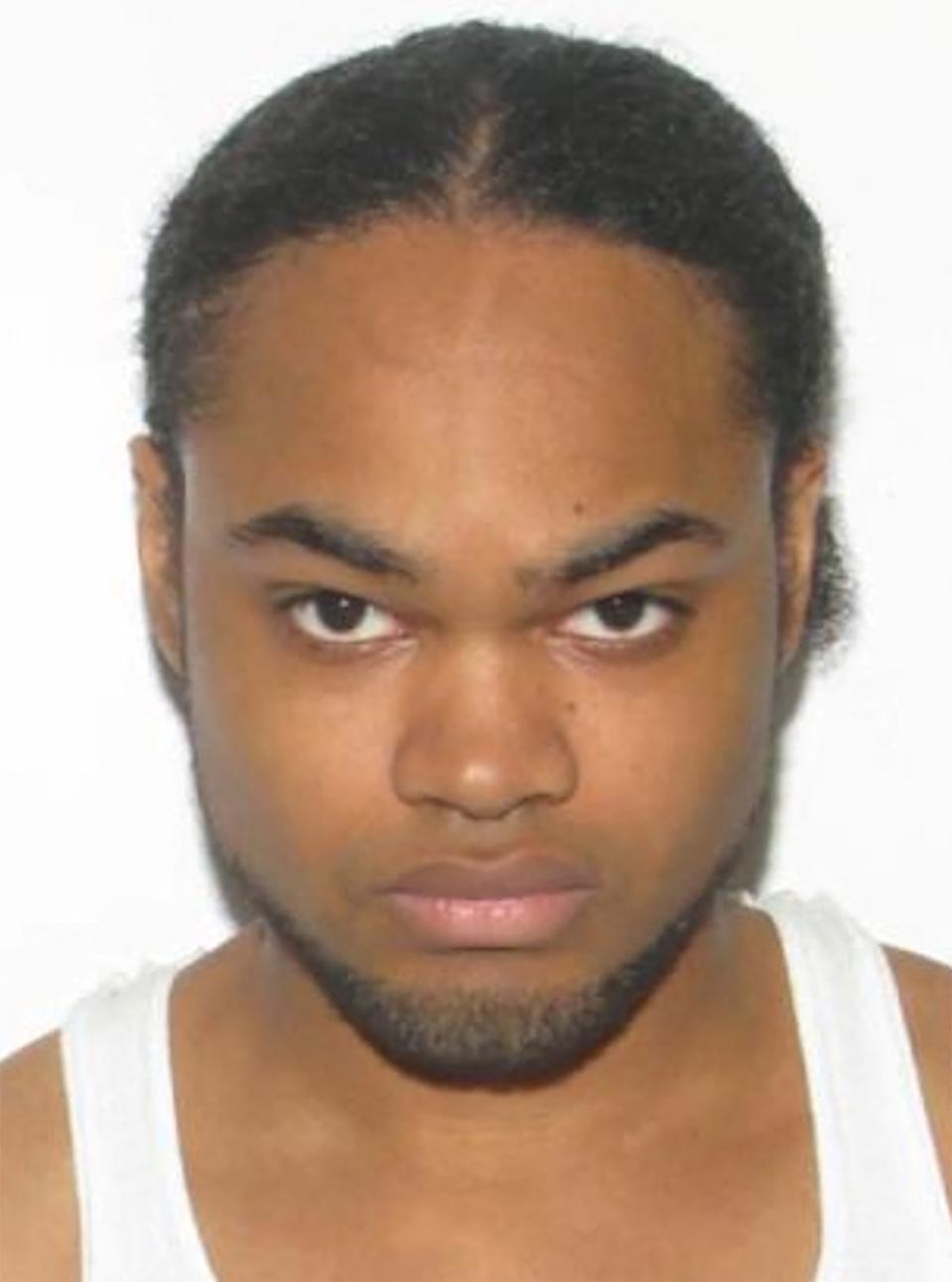 <div class="inline-image__caption"><p>Andre Bing, 31, the suspect in the deadly shooting of fellow employees at a Walmart store in Chesapeake, Virginia.</p></div> <div class="inline-image__credit">Chesapeake Police Department</div>