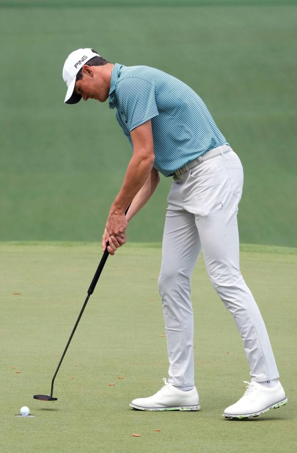 Apr 11, 2024; Augusta, Georgia, USA; Christo Lamprecht putts on the seventh green during the first round of the Masters Tournament. Mandatory Credit: Michael Madrid-USA TODAY Network Michael Madrid, Michael Madrid/Michael Madrid, Michael Madrid / USA TODAY NETWORK