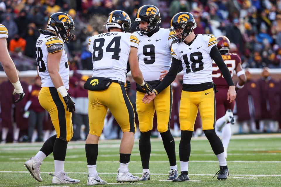 Iowa kicker Drew Stevens (18) celebrates a field goal against Minnesota during the first quarter Saturday.