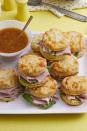 <p>Snack on these mini ham sandwiches while you wait for the main event: the annual <a href="https://www.womansday.com/life/g2892/easter-egg-hunt-ideas/" rel="nofollow noopener" target="_blank" data-ylk="slk:Easter egg hunt;elm:context_link;itc:0;sec:content-canvas" class="link ">Easter egg hunt</a>.</p><p><strong><em><a href="https://www.womansday.com/food-recipes/food-drinks/a19094239/ham-biscuits-recipe/" rel="nofollow noopener" target="_blank" data-ylk="slk:Get the Ham Biscuits recipe.;elm:context_link;itc:0;sec:content-canvas" class="link ">Get the Ham Biscuits recipe.</a></em></strong> </p>