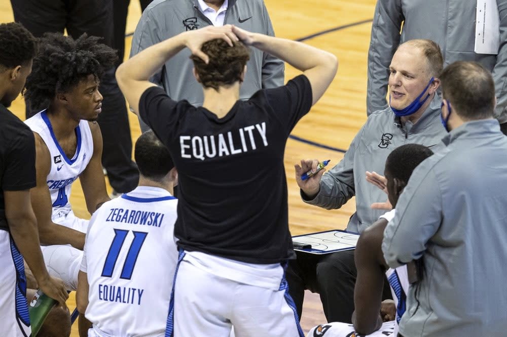 Creighton assistant coach Alan Huss talks to players during the second half against Butler in an NCAA college basketball game Saturday, March 6, 2021, in Omaha, Neb. Creighton coach Greg McDermott was suspended earlier in the week. (Chris Machian/Omaha World-Herald via AP)