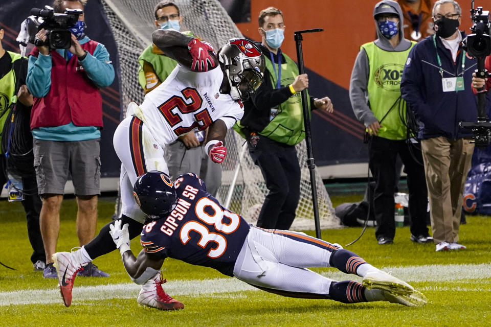 Tampa Bay Buccaneers running back Ronald Jones (27) had a touchdown taken away on an odd call. (AP Photo/Charles Rex Arbogast)