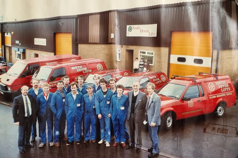 Cyril 'David' Smith with his old company, South Devon Lifts, pictured far right