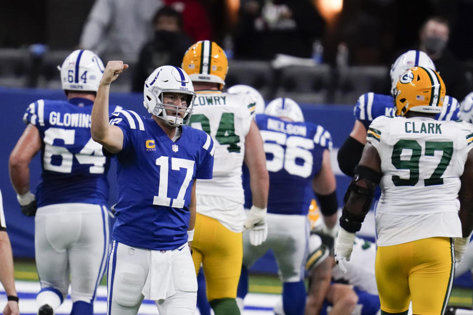 Indianapolis Colts quarterback Philip Rivers (17) celebrates throwing a touchdown pass during the second half of an NFL football game against the Green Bay Packers, Sunday, Nov. 22, 2020, in Indianapolis. (AP Photo/Michael Conroy)