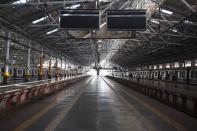 A deserted view of Chhatrapati Shivaji Maharaj railway terminus is seen during a one-day Janata (civil) curfew imposed amid concerns over the spread of the COVID-19 novel coronavirus, in Mumbai on March 22, 2020. (Photo by Punit PARANJPE / AFP) (Photo by PUNIT PARANJPE/AFP via Getty Images)