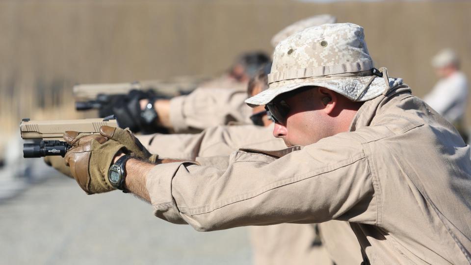 US Marines train with M45A1 pistols. <em>USMC</em>