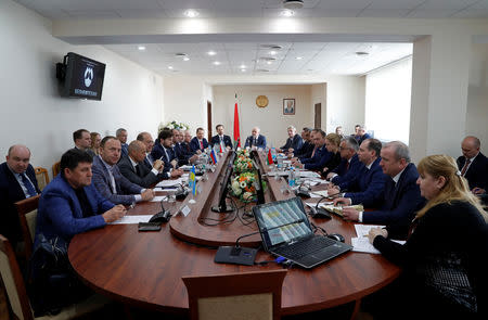 Representatives of Russian Transneft, Ukranian Ukrtransnafta, Polish Pern and Belarusian Belneftekhim gather to hold talks on fixing tainted oil supplies to Europe, in Minsk, Belarus April 26, 2019. REUTERS/Vasily Fedosenko