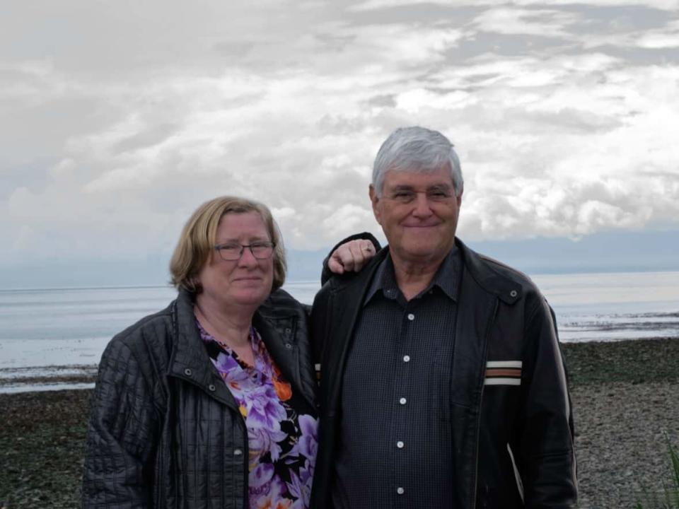 Leigh and Frank Michel of Marquis, Sask., were denied compensation by Air Canada after flight disruptions in June left them sleeping on an airport floor.  (Frank Michel - image credit)
