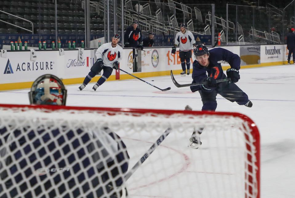 The Coachella Valley Firebirds practice for the first time on the main rink at Acrisure Arena in Thousand Palms, Calif., Dec. 12, 2022. 