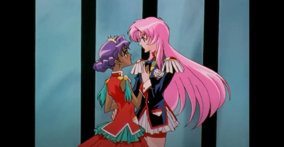 Utena embraces the beautiful Anthy Himemiya and stares into her eyes