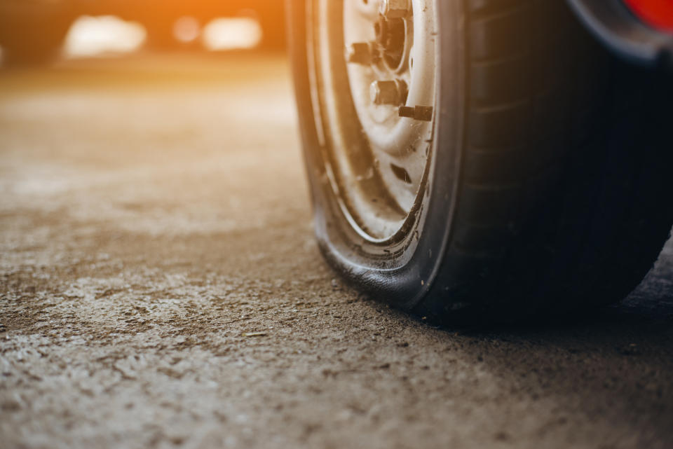 Car with damaged tyre. Source: Getty Images