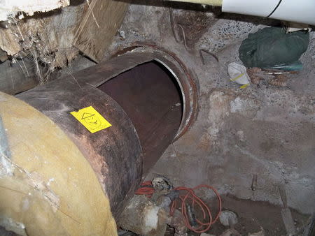 A note with a caption "Have a nice day" left on an opening in the pipe, where two inmates are suspected to have cut open as part of their escape from Clinton Correctional Facility in Dannemora, New York, is seen in this New York Governor's Press Office handout photo taken June 6, 2015 and released on June 7, 2015. REUTERS/New York Governor's Press Office/Handout via Reuters