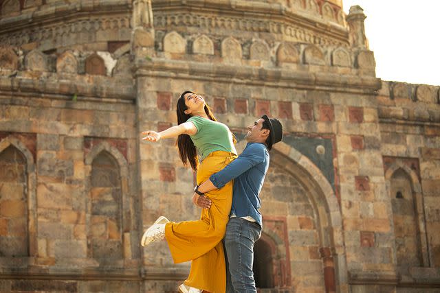 <p>Getty</p> A stock image of a couple on vacation