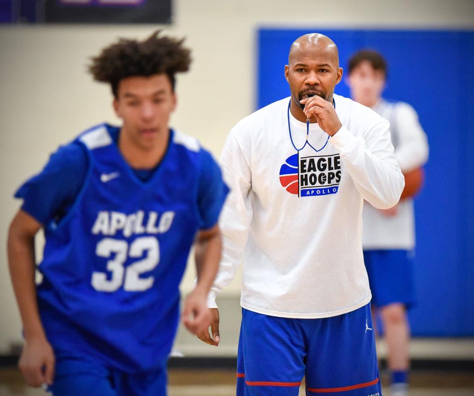 Apollo basketball coach Jason Allen runs players through drills during practice Thursday, Dec. 20, at Apollo High School.