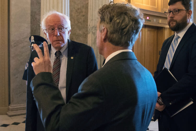 Sen. Bernie Sanders, a self-proclaimed democratic socialist, wants to increase federal spending on education while Sen. Rand Paul, a Republican leery of government, proposes to eliminate the U.S. Department of Education. (Chip Somodevilla/Getty Image)