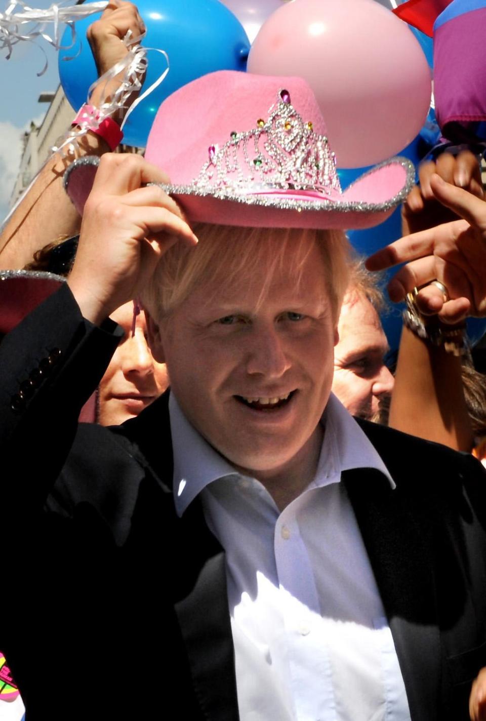 Boris Johnson wears a pink cowboy hat at the Pride London parade (Anthony Delvin/PA) (PA Archive)