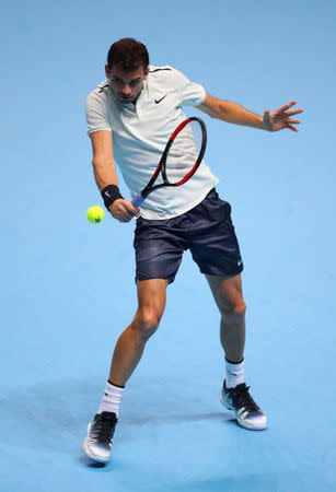 Tennis - ATP World Tour Finals - The O2 Arena, London, Britain - November 13, 2017 Bulgaria’s Grigor Dimitrov in action during his group stage match against Austria’s Dominic Thiem REUTERS/Hannah McKay